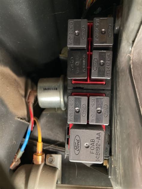 2004 ford explorer auxiliary junction box location|2000 Ford auxiliary box location.